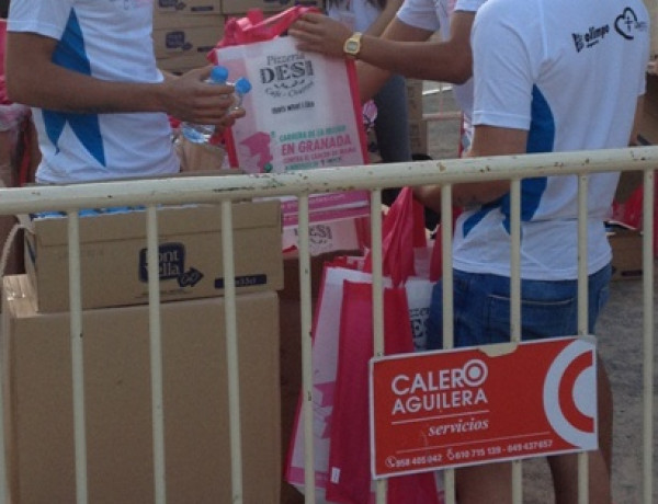 Menores voluntarios de 'San Miguel' en la Carrera de la Mujer contra el Cáncer de Mama. Fundación Diagrama. 