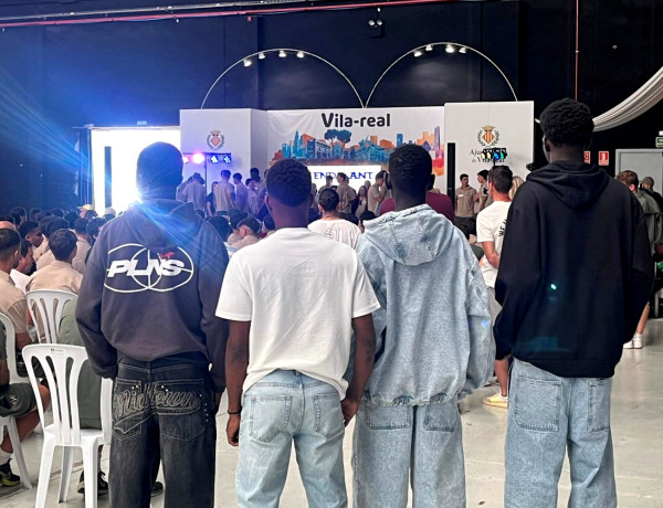 Cuatro jóvenes de la residencia, en el acto de clausura