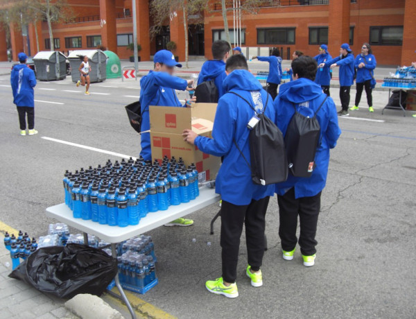 Jóvenes atendidos por Fundación Diagrama participan como voluntarios en la Media Maratón de Valencia. Centro 'Campanar', 'Anassim' y 'La Pobla' (Valencia). Fundación Diagrama. Comunidad Valenciana 2018. 