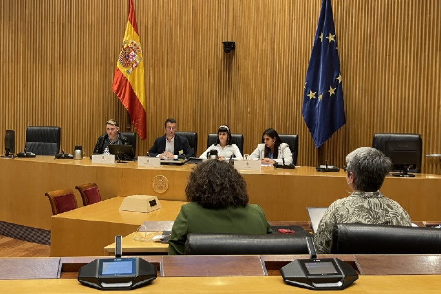 Los tres jóvenes, durante su intervención en el encuentro